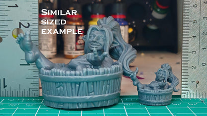 Female Orc Crushing Watermelon Bae Victis Figurine - by Vae Victis Miniatures